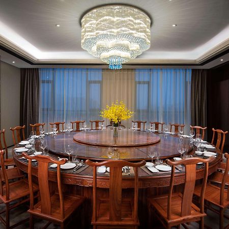 Ramada Wyndham Zhengzhou Xinzheng Hotel Xinzheng  Bagian luar foto