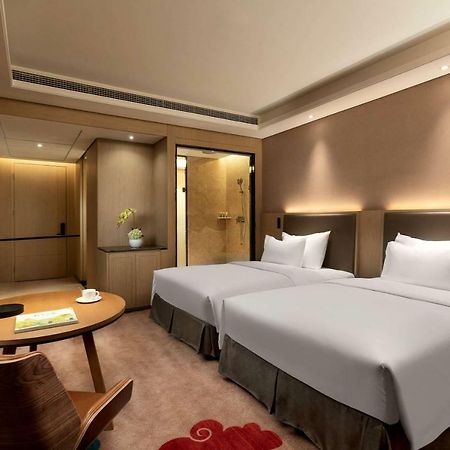 Ramada Wyndham Zhengzhou Xinzheng Hotel Xinzheng  Bagian luar foto