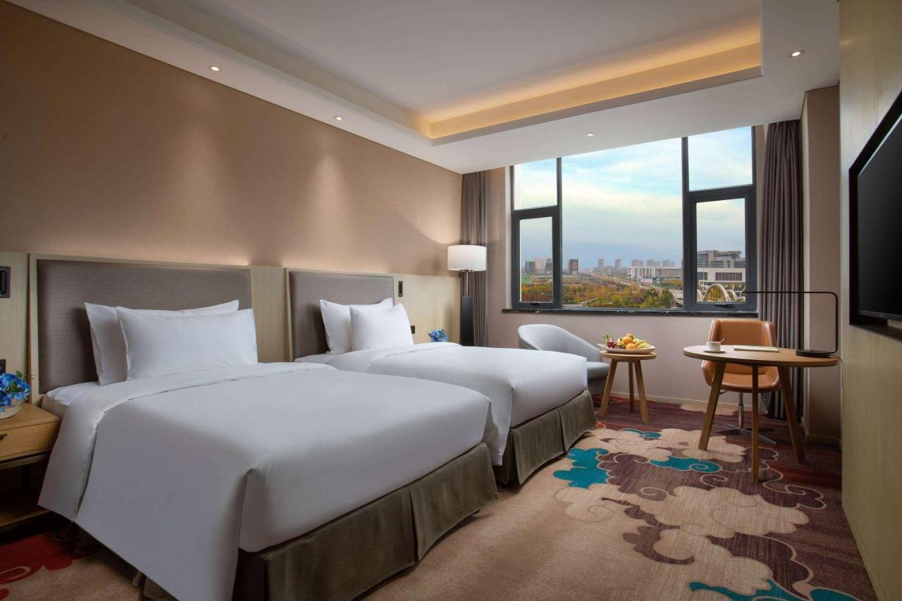 Ramada Wyndham Zhengzhou Xinzheng Hotel Xinzheng  Bagian luar foto
