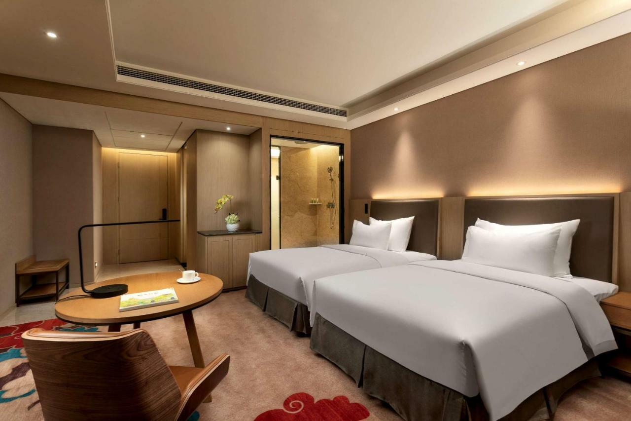 Ramada Wyndham Zhengzhou Xinzheng Hotel Xinzheng  Bagian luar foto